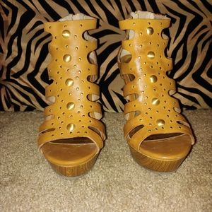 Tan wedges, gently worn,